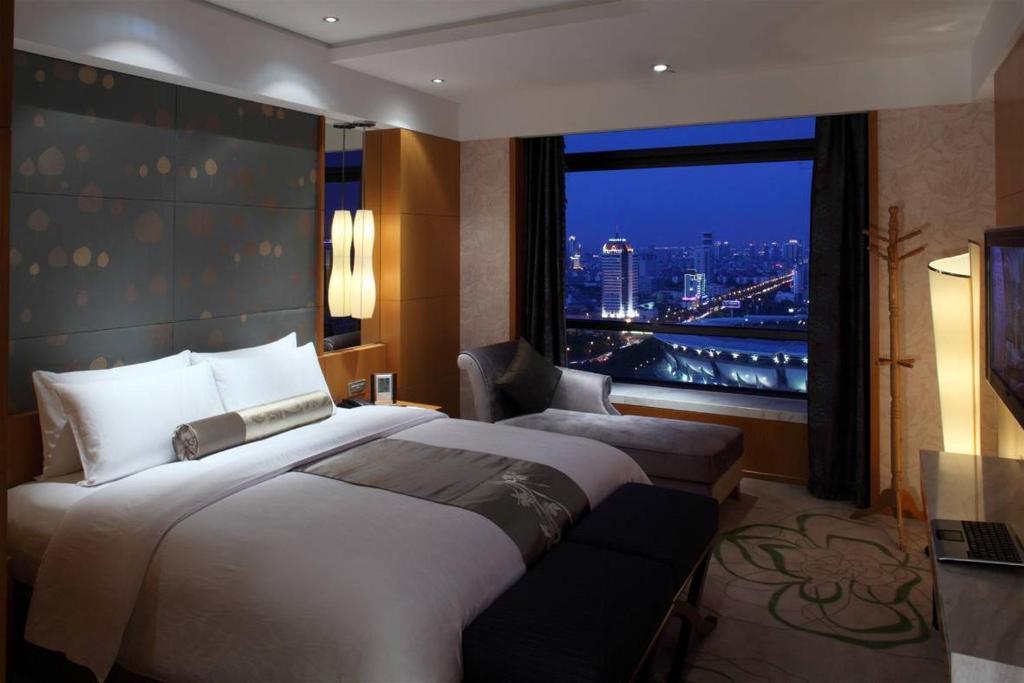 New City Garden Hotel سوجو الغرفة الصورة