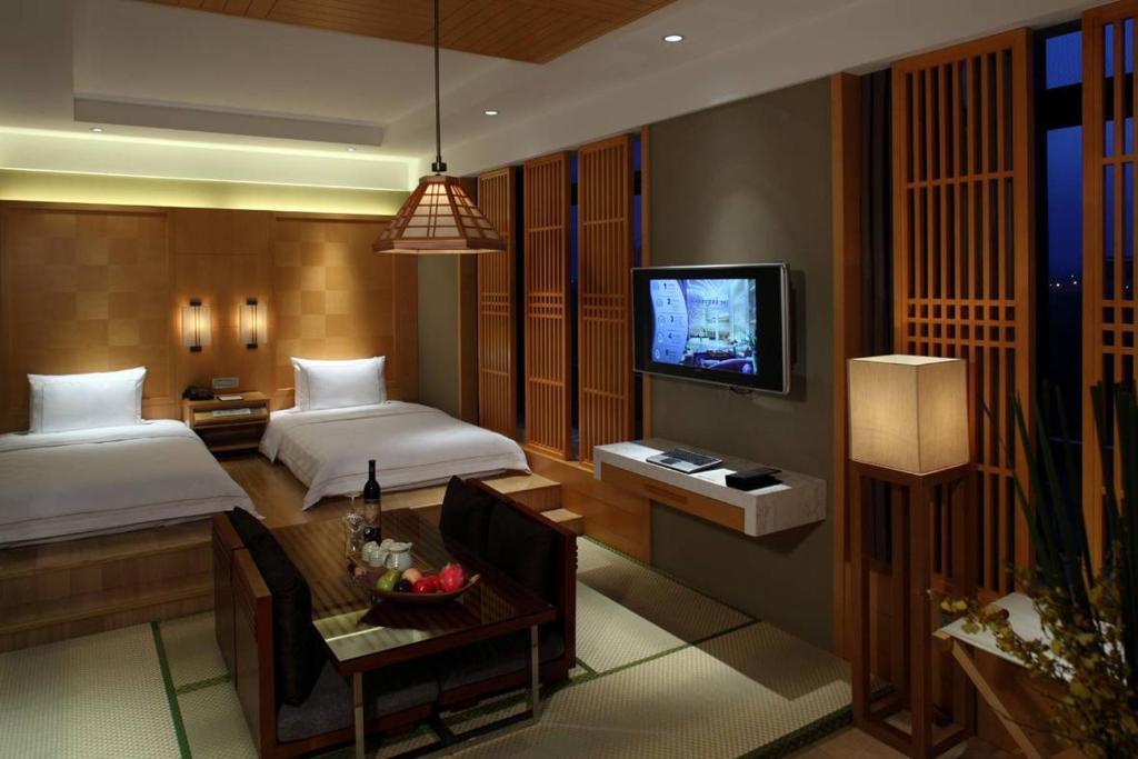 New City Garden Hotel سوجو الغرفة الصورة